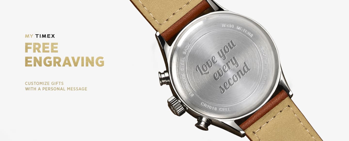 Back of silver watch with brown leather straps with engraving in it saying "Love you every second'